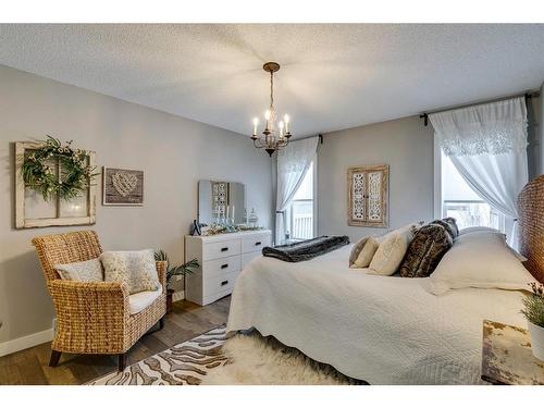 940 Woodside Lane Nw, Airdrie, AB - Indoor Photo Showing Bedroom