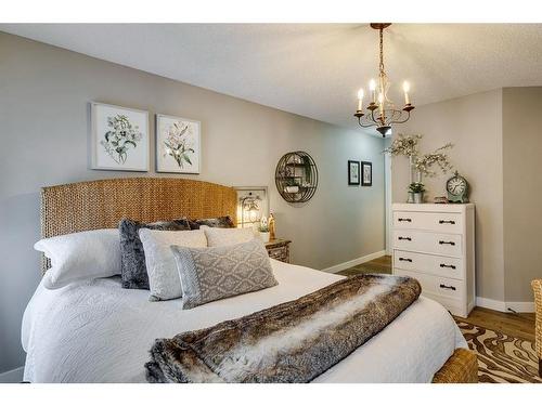 940 Woodside Lane Nw, Airdrie, AB - Indoor Photo Showing Bedroom