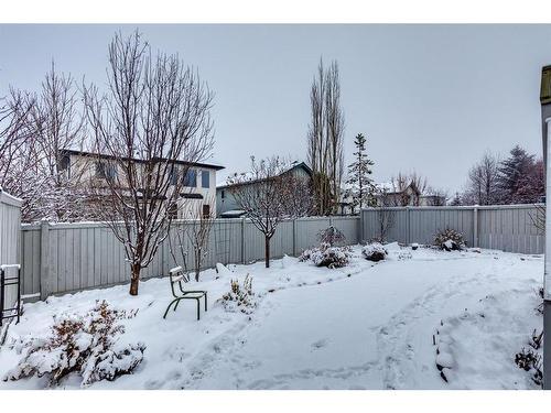 940 Woodside Lane Nw, Airdrie, AB - Outdoor With Backyard