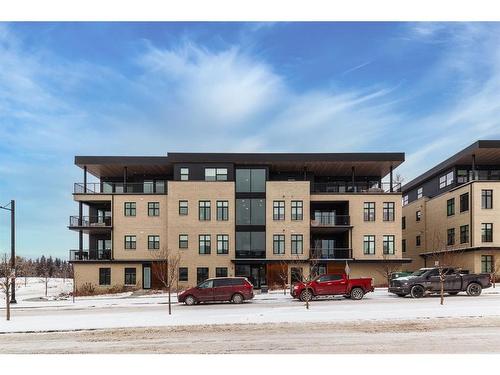 202-235 Lebel Crescent Nw, Calgary, AB - Outdoor With Balcony With Facade