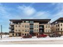 202-235 Lebel Crescent Nw, Calgary, AB  - Outdoor With Balcony With Facade 