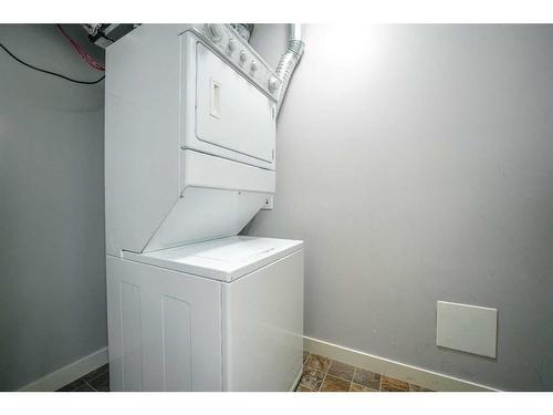 906-250 Sage Valley Road Nw, Calgary, AB - Indoor Photo Showing Laundry Room