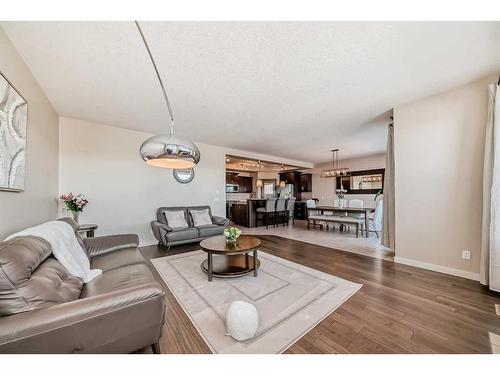 50 Aspen Hills Way Sw, Calgary, AB - Indoor Photo Showing Living Room