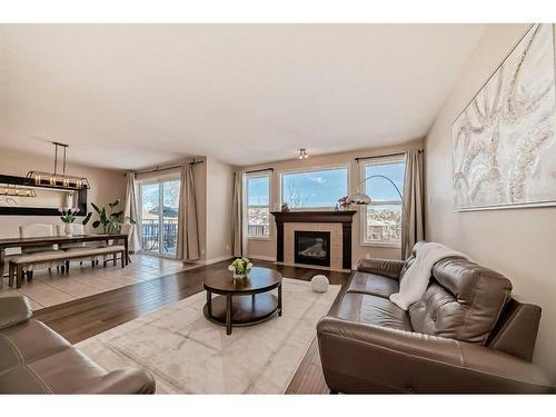 50 Aspen Hills Way Sw, Calgary, AB - Indoor Photo Showing Living Room With Fireplace