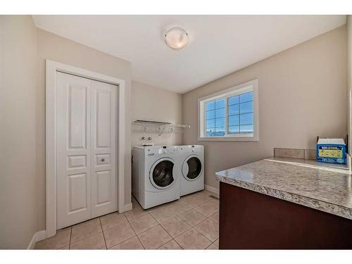 50 Aspen Hills Way Sw, Calgary, AB - Indoor Photo Showing Laundry Room