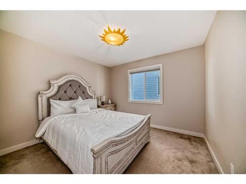 50 Aspen Hills Way Sw, Calgary, AB - Indoor Photo Showing Bedroom