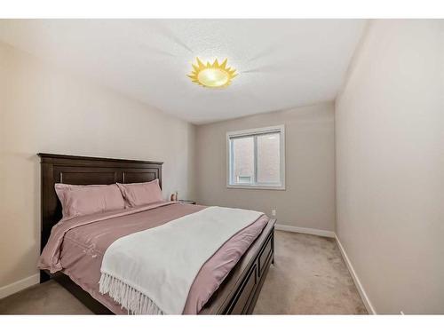 50 Aspen Hills Way Sw, Calgary, AB - Indoor Photo Showing Bedroom