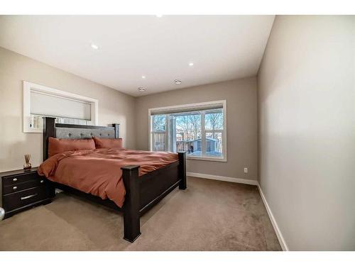 50 Aspen Hills Way Sw, Calgary, AB - Indoor Photo Showing Bedroom