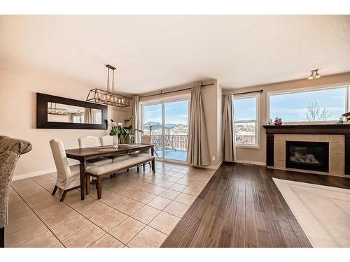 50 Aspen Hills Way Sw, Calgary, AB - Indoor With Fireplace