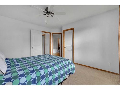 15894 Everstone Road Sw, Calgary, AB - Indoor Photo Showing Bedroom