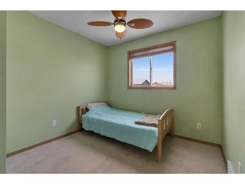 15894 Everstone Road Sw, Calgary, AB - Indoor Photo Showing Bedroom