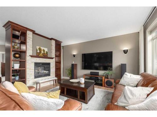 138 Aspen Stone Grove Sw, Calgary, AB - Indoor Photo Showing Living Room With Fireplace