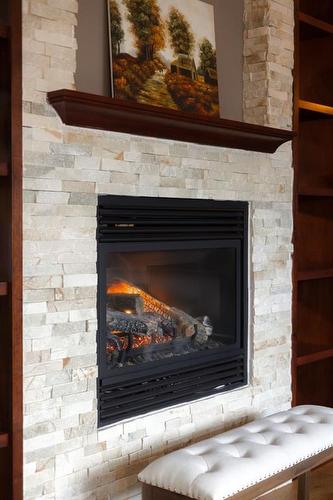 138 Aspen Stone Grove Sw, Calgary, AB - Indoor Photo Showing Living Room With Fireplace