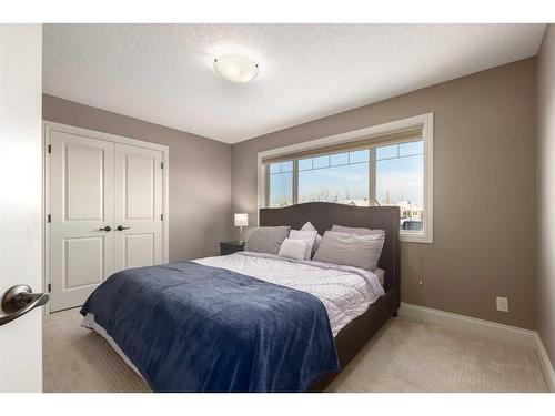 138 Aspen Stone Grove Sw, Calgary, AB - Indoor Photo Showing Bedroom