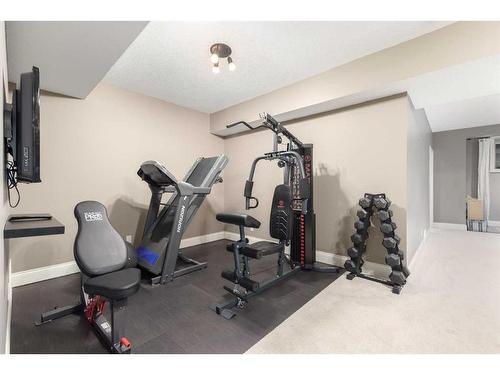 138 Aspen Stone Grove Sw, Calgary, AB - Indoor Photo Showing Gym Room