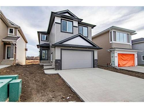 19 Memorial Parkway Sw, Rural Red Deer County, AB - Outdoor With Facade