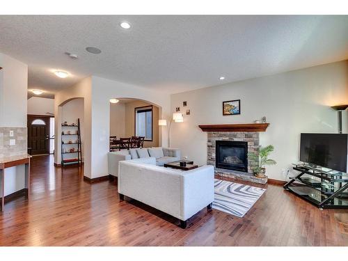 7 Aspen Stone Way Sw, Calgary, AB - Indoor Photo Showing Living Room With Fireplace