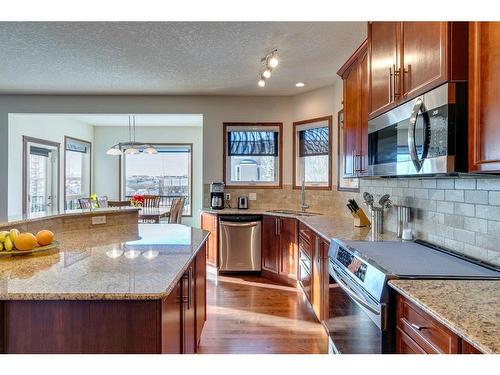 7 Aspen Stone Way Sw, Calgary, AB - Indoor Photo Showing Kitchen With Stainless Steel Kitchen With Upgraded Kitchen