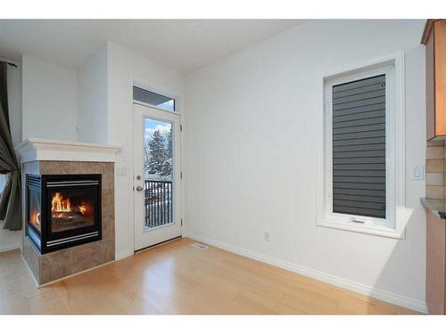 201-824 10 Street Nw, Calgary, AB - Indoor With Fireplace