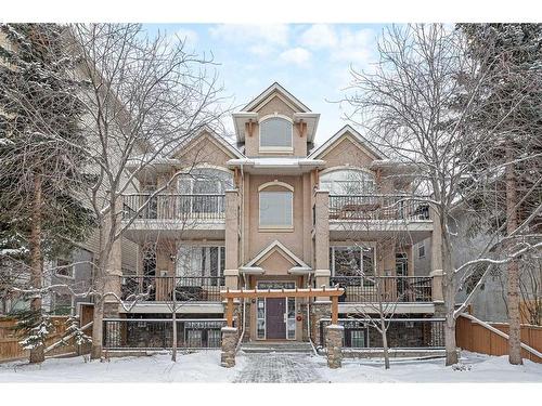 201-824 10 Street Nw, Calgary, AB - Outdoor With Facade