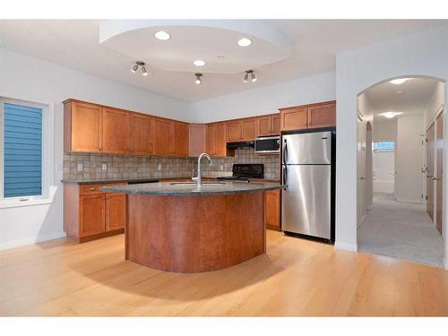 201-824 10 Street Nw, Calgary, AB - Indoor Photo Showing Kitchen With Stainless Steel Kitchen