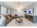 429 Cranbrook Gardens Se, Calgary, AB  - Indoor Photo Showing Living Room 