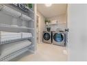 429 Cranbrook Gardens Se, Calgary, AB  - Indoor Photo Showing Laundry Room 