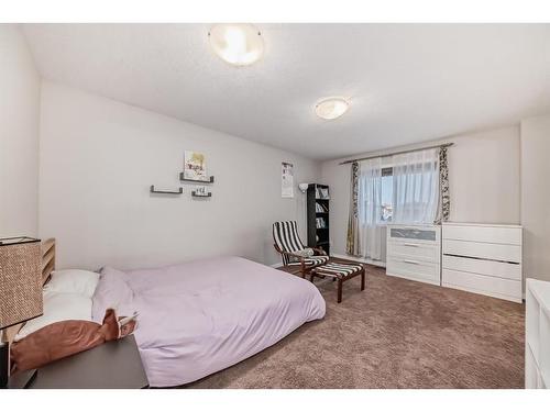 21 Panora Street Nw, Calgary, AB - Indoor Photo Showing Bedroom