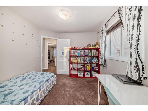 21 Panora Street Nw, Calgary, AB - Indoor Photo Showing Bedroom