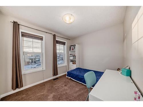 21 Panora Street Nw, Calgary, AB - Indoor Photo Showing Bedroom