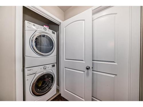 21 Panora Street Nw, Calgary, AB - Indoor Photo Showing Laundry Room