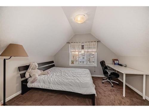 21 Panora Street Nw, Calgary, AB - Indoor Photo Showing Bedroom