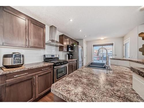 21 Panora Street Nw, Calgary, AB - Indoor Photo Showing Kitchen With Double Sink