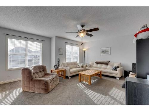 113 Cranleigh Bay Se, Calgary, AB - Indoor Photo Showing Living Room