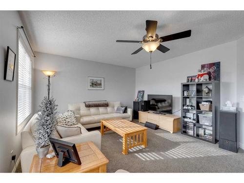 113 Cranleigh Bay Se, Calgary, AB - Indoor Photo Showing Living Room