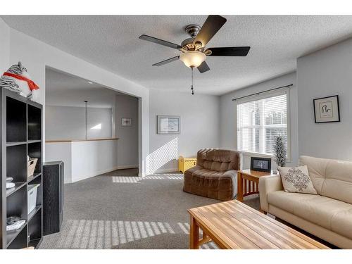 113 Cranleigh Bay Se, Calgary, AB - Indoor Photo Showing Living Room