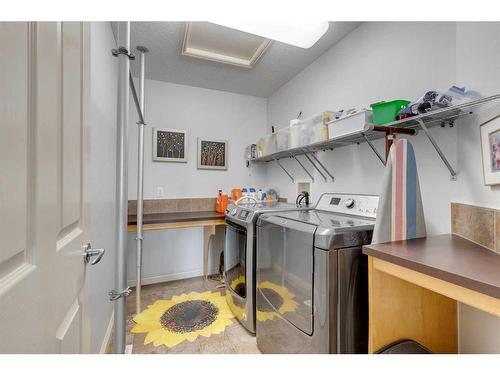 113 Cranleigh Bay Se, Calgary, AB - Indoor Photo Showing Laundry Room