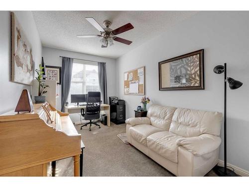 113 Cranleigh Bay Se, Calgary, AB - Indoor Photo Showing Living Room