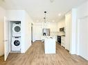 2116-111 Wolf Creek Drive Se, Calgary, AB  - Indoor Photo Showing Kitchen 