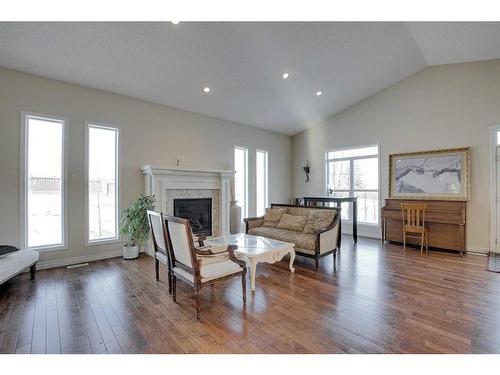 384 Prestwick Terrace Se, Calgary, AB - Indoor Photo Showing Living Room With Fireplace