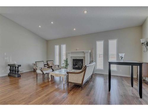 384 Prestwick Terrace Se, Calgary, AB - Indoor Photo Showing Other Room With Fireplace