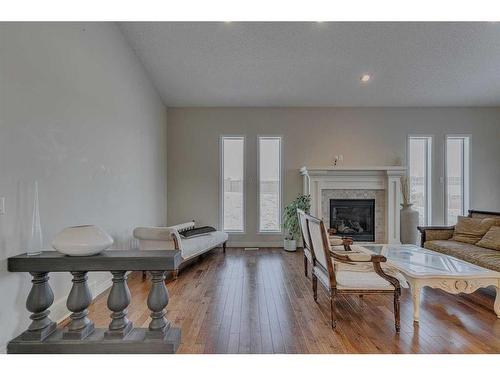 384 Prestwick Terrace Se, Calgary, AB - Indoor Photo Showing Living Room With Fireplace