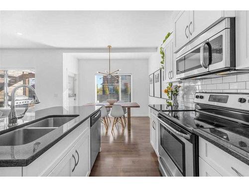 277 Willow Park, Cochrane, AB - Indoor Photo Showing Kitchen With Double Sink