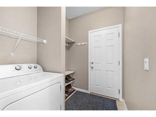 277 Willow Park, Cochrane, AB - Indoor Photo Showing Laundry Room