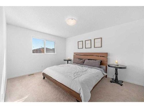 277 Willow Park, Cochrane, AB - Indoor Photo Showing Bedroom