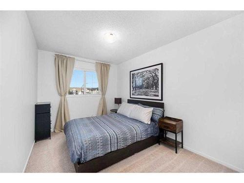 277 Willow Park, Cochrane, AB - Indoor Photo Showing Bedroom