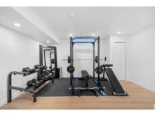 277 Willow Park, Cochrane, AB - Indoor Photo Showing Gym Room