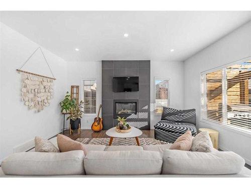 277 Willow Park, Cochrane, AB - Indoor Photo Showing Living Room With Fireplace