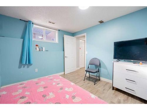 176 Martinvalley Crescent Ne, Calgary, AB - Indoor Photo Showing Bedroom