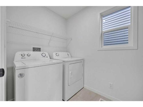 166 Edith Road Nw, Calgary, AB - Indoor Photo Showing Laundry Room